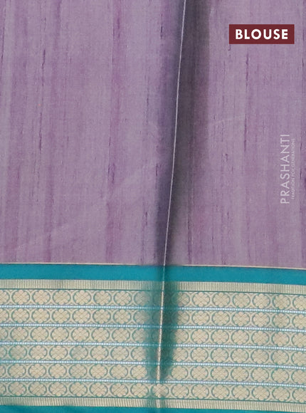 Semi kanchipuram silk saree mild purple shade and teal green with butta prints and zari woven border