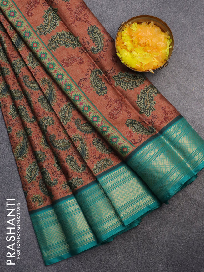 Semi kanchipuram silk saree rust shade and teal green with allover digital prints and zari woven border