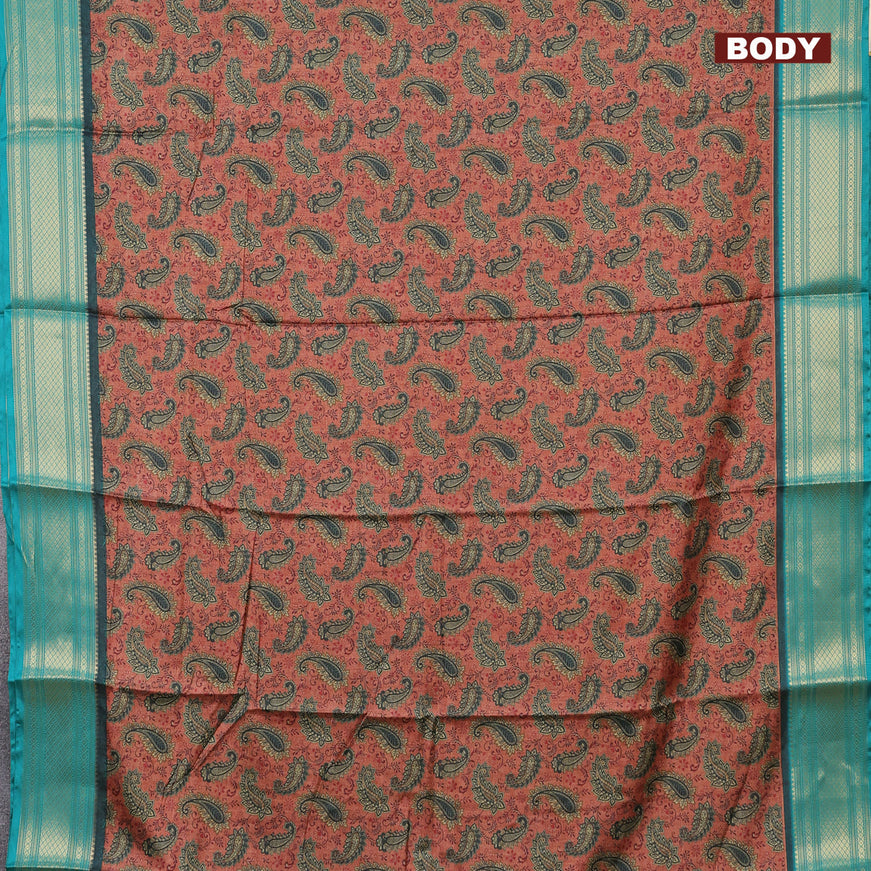 Semi kanchipuram silk saree rust shade and teal green with allover digital prints and zari woven border