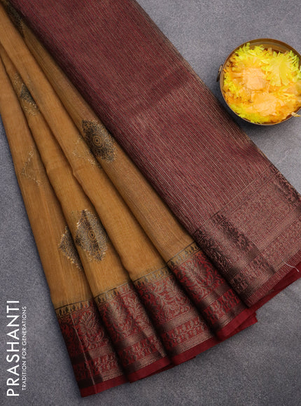 Banarasi semi matka saree sandal and maroon with antique zari woven buttas and antique zari border