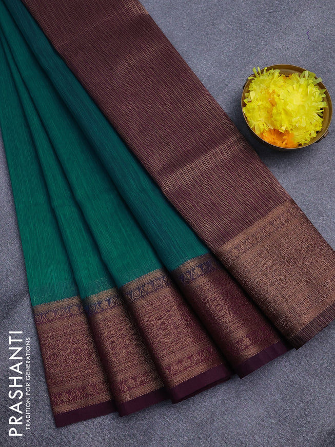 Banarasi semi matka saree teal blue and wine shade with plain body and antique zari border