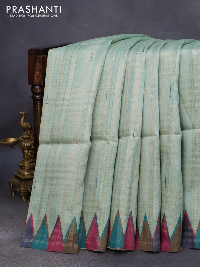 Semi tussar saree pastel green and multi colour with allover zari weaves & muniya butta prints and temple design border