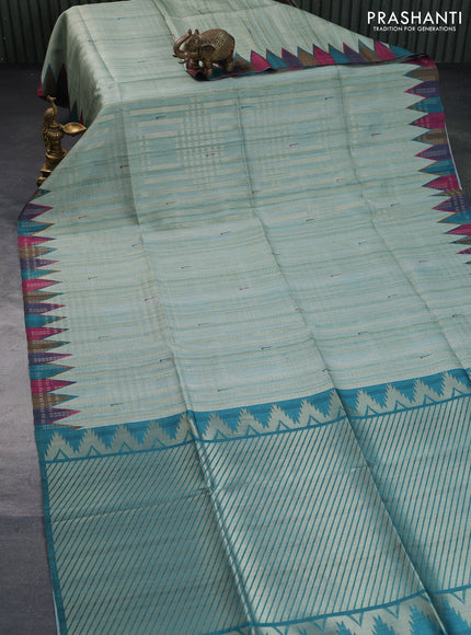 Semi tussar saree pastel green and multi colour with allover zari weaves & muniya butta prints and temple design border