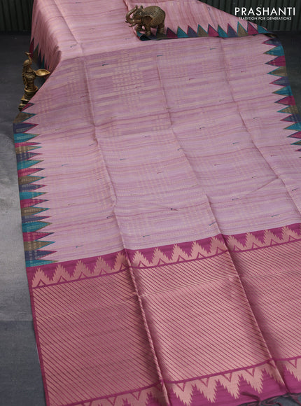 Semi tussar saree pastel pink and multi colour with allover zari weaves & muniya butta prints and temple design border