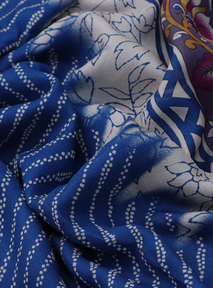 Semi georgette saree peacock blue with allover prints and long zari woven border