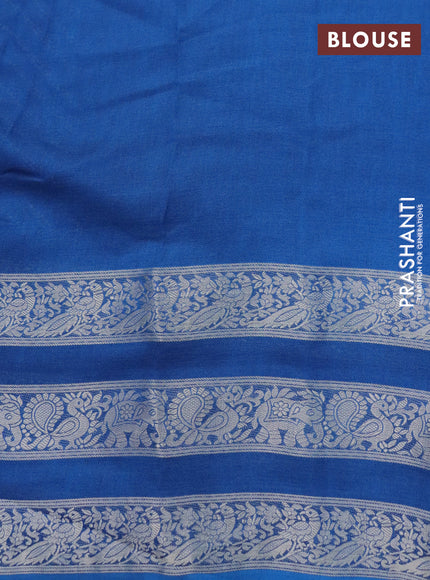 Semi georgette saree peacock blue with allover prints and long zari woven border