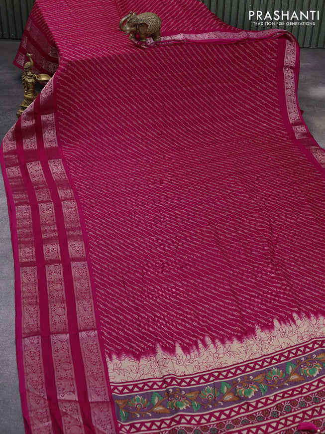 Semi georgette saree pink with allover prints and long zari woven border