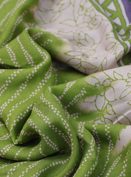 Semi georgette saree light green with allover prints and long zari woven border