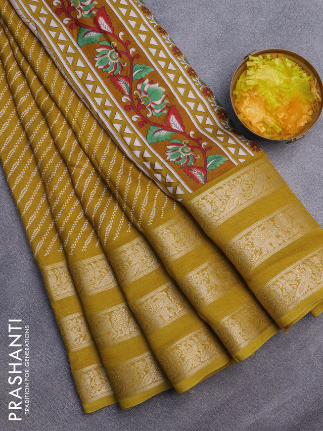 Semi georgette saree mustard yellow with allover prints and long zari woven border