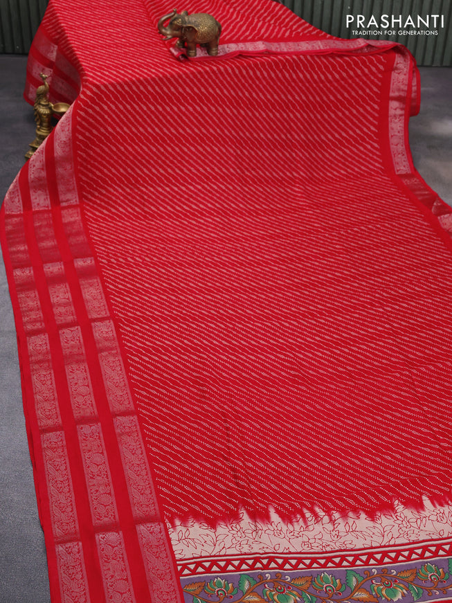 Semi georgette saree red with allover prints and long zari woven border