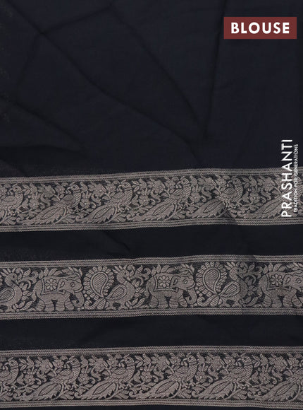 Semi georgette saree black with allover prints and long zari woven border