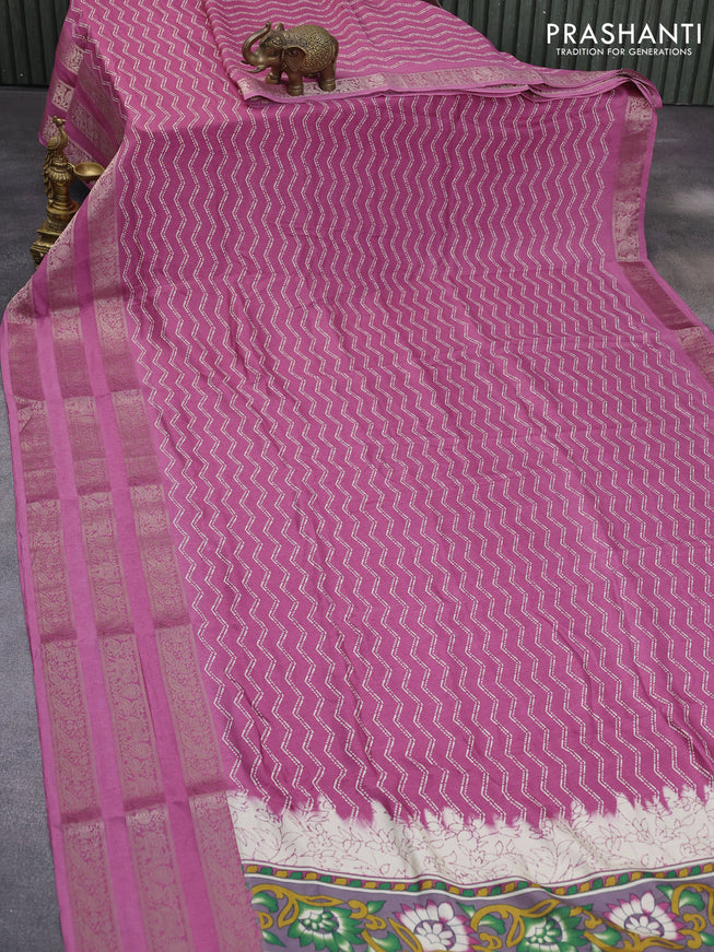 Semi georgette saree mauve pink with allover zig zag prints and long zari woven border