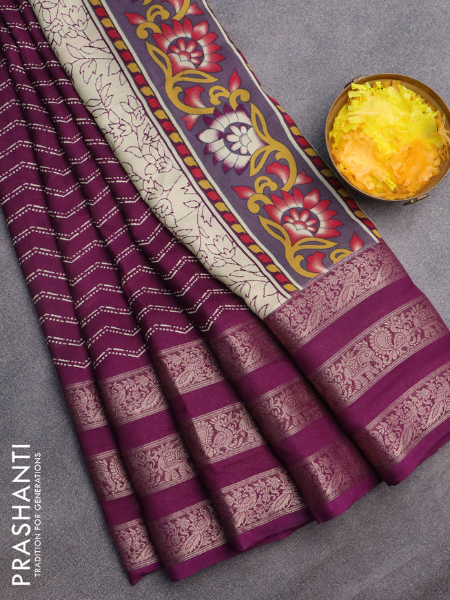 Semi georgette saree deep purple with allover zig zag prints and long zari woven border