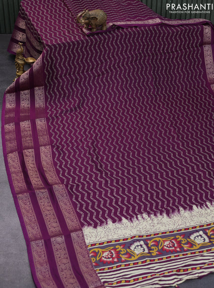 Semi georgette saree deep purple with allover zig zag prints and long zari woven border