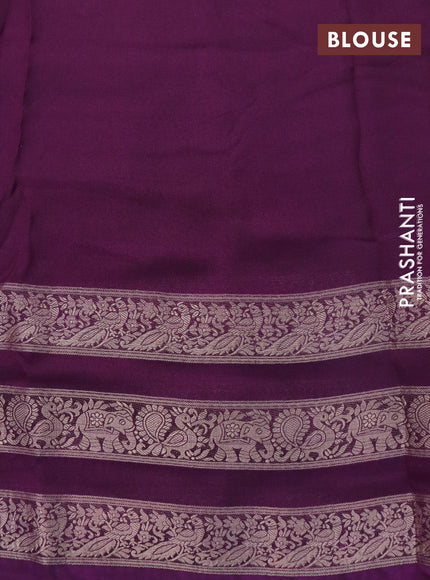 Semi georgette saree deep purple with allover zig zag prints and long zari woven border