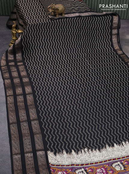 Semi georgette saree black with allover zig zag prints and long zari woven border