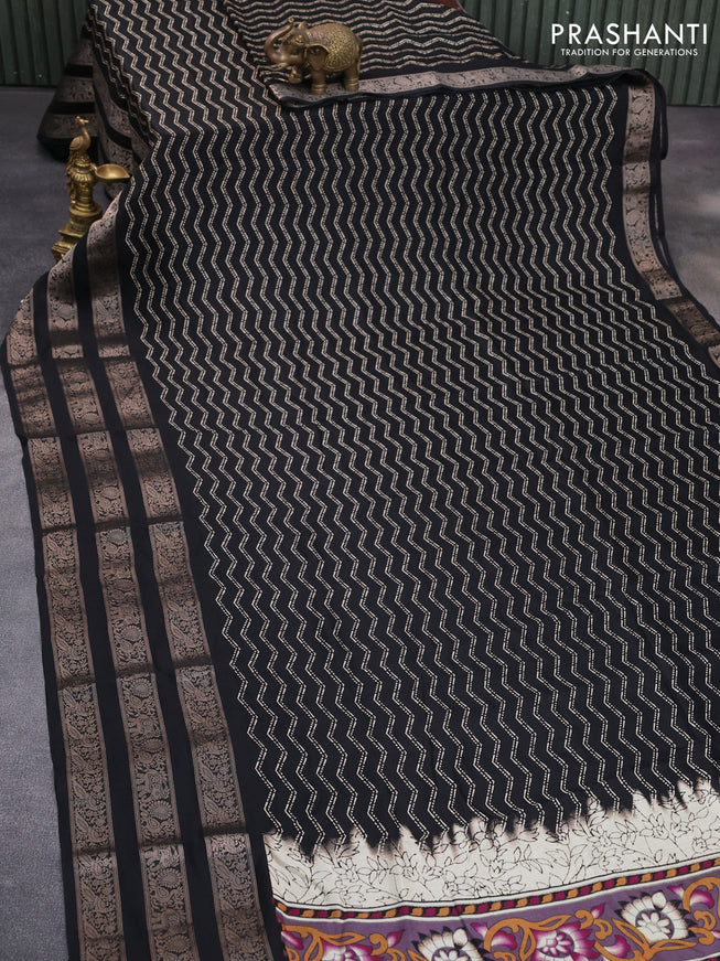 Semi georgette saree black with allover zig zag prints and long zari woven border