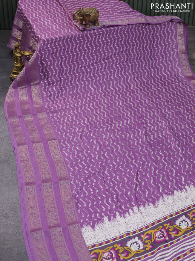 Semi georgette saree lavender shade with allover zig zag prints and long zari woven border