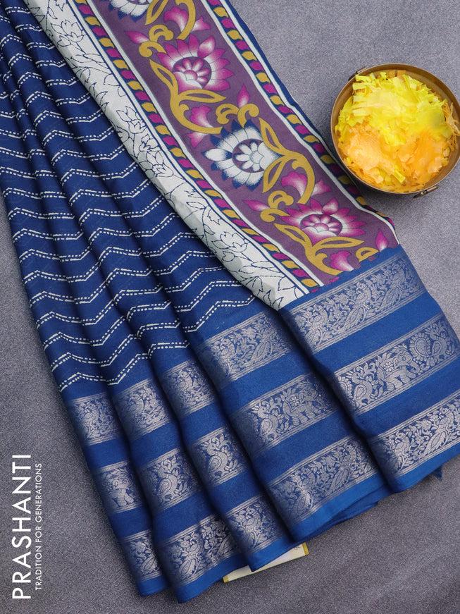 Semi georgette saree cs blue with allover zig zag prints and long zari woven border