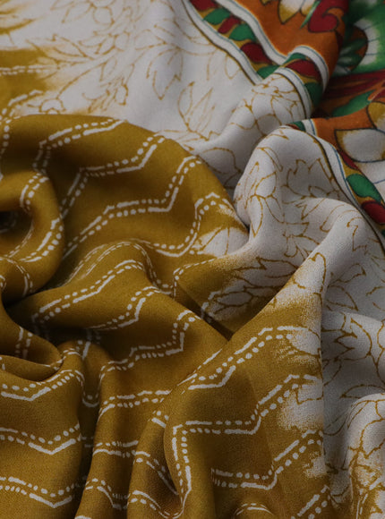 Semi georgette saree mustard yellow with allover zig zag prints and long zari woven border