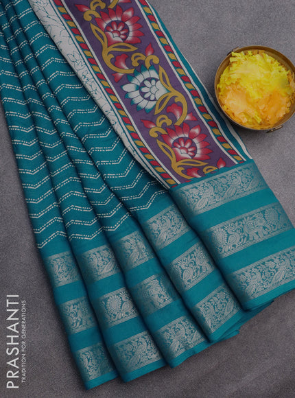 Semi georgette saree cs blue with allover zig zag prints and long zari woven border