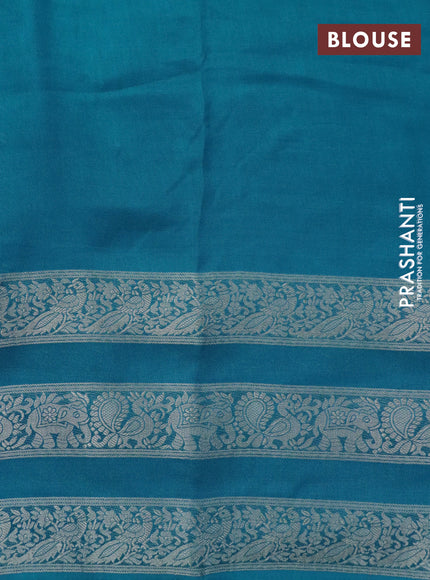 Semi georgette saree cs blue with allover zig zag prints and long zari woven border