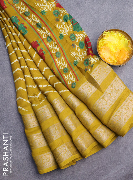 Semi georgette saree mustard yellow with allover zig zag prints and long zari woven border