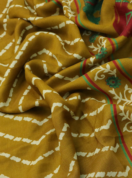 Semi georgette saree mustard yellow with allover zig zag prints and long zari woven border