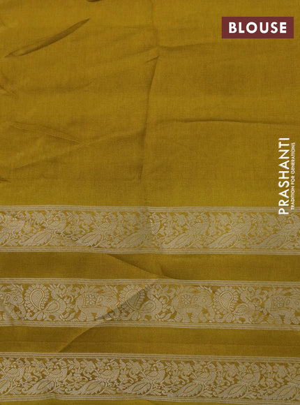 Semi georgette saree mustard yellow with allover zig zag prints and long zari woven border