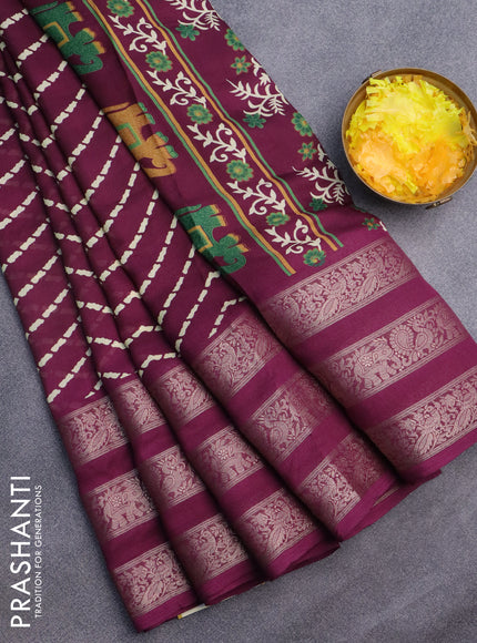 Semi georgette saree wine shade with allover zig zag prints and long zari woven border