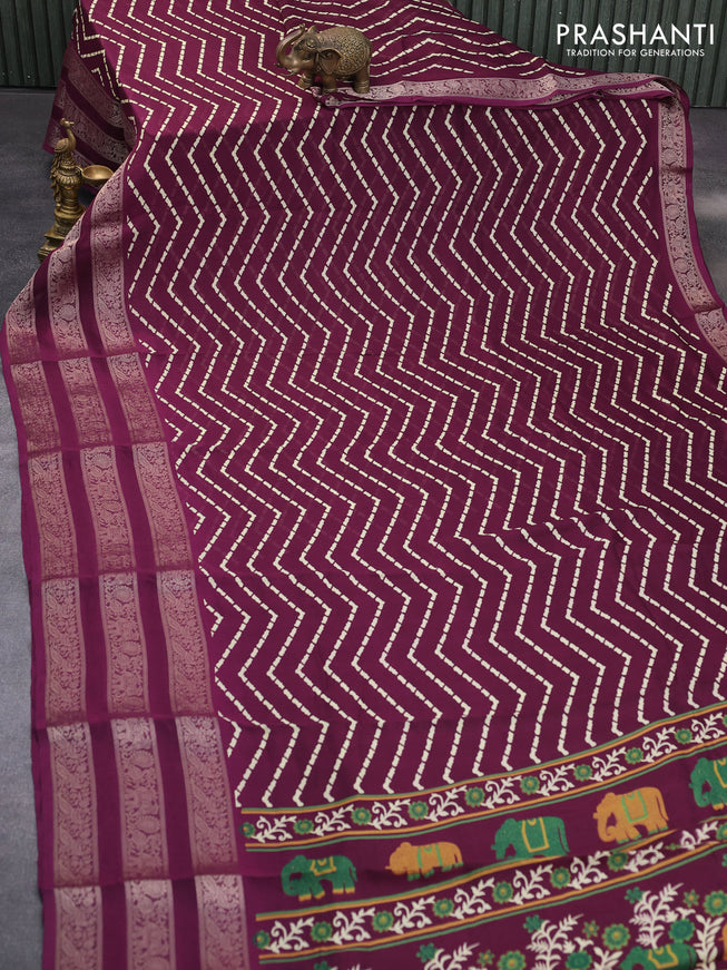 Semi georgette saree wine shade with allover zig zag prints and long zari woven border