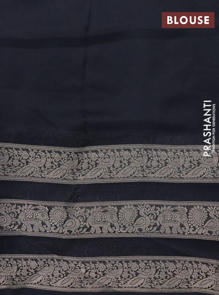 Semi georgette saree black with allover zig zag prints and long zari woven border