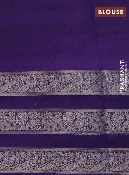 Semi georgette saree deep violet with allover zig zag prints and long zari woven border