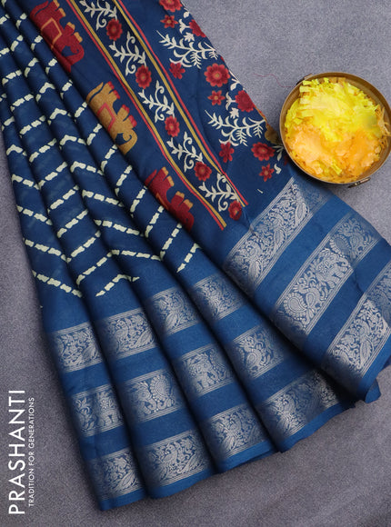 Semi georgette saree peacock blue with allover zig zag prints and long zari woven border