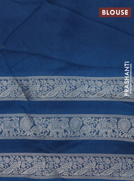 Semi georgette saree peacock blue with allover zig zag prints and long zari woven border