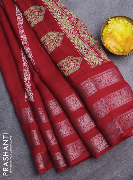 Semi georgette saree red with allover prints and long zari woven border