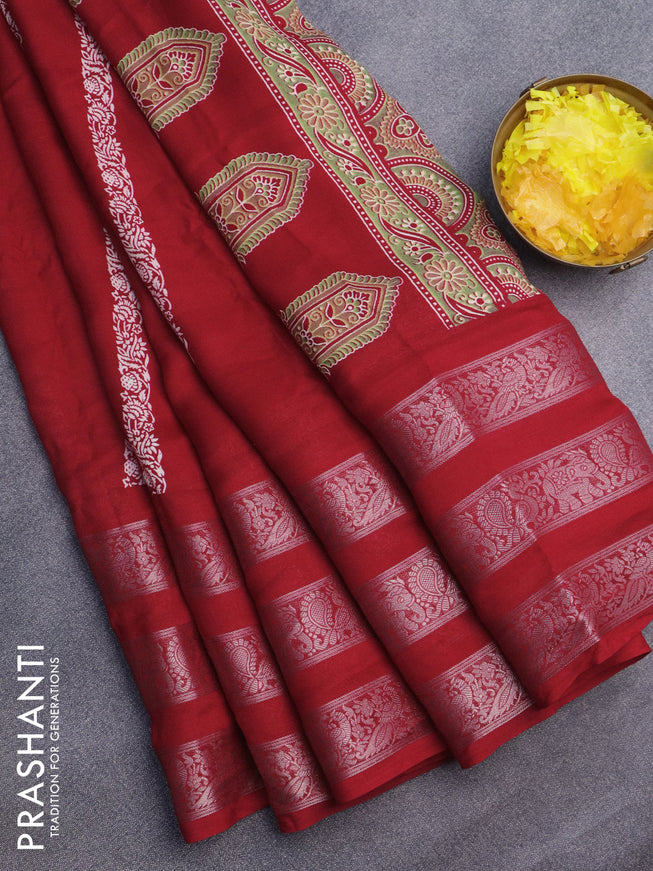 Semi georgette saree red with allover prints and long zari woven border