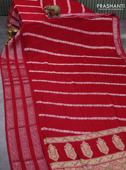 Semi georgette saree red with allover prints and long zari woven border