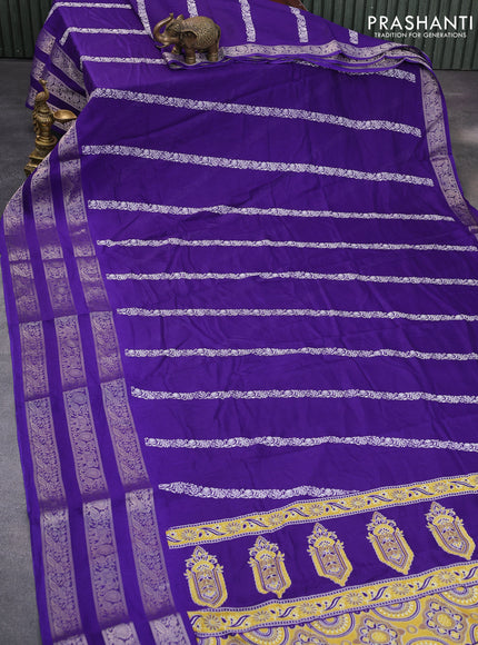 Semi georgette saree violet with allover prints and long zari woven border