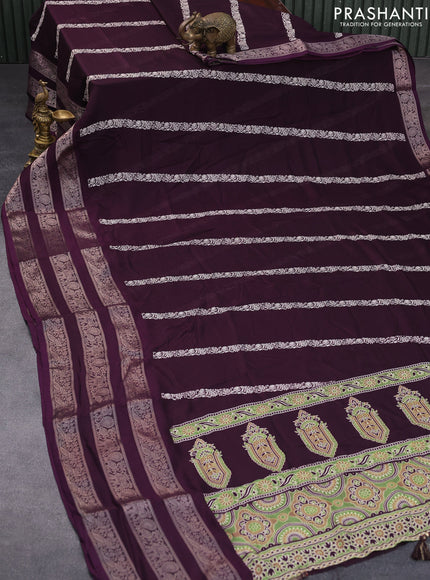 Semi georgette saree deep wine shade with allover prints and long zari woven border