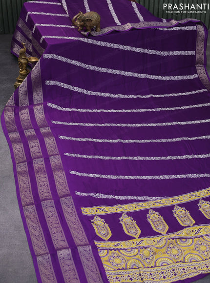 Semi georgette saree violet with allover prints and long zari woven border