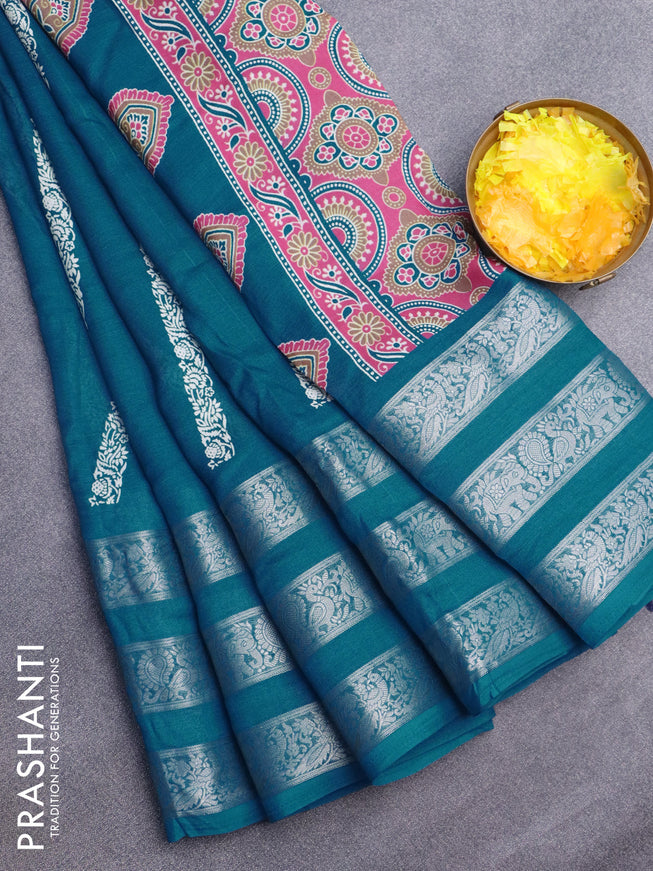 Semi georgette saree cs blue with allover prints and long zari woven border