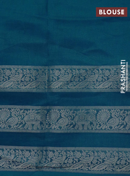 Semi georgette saree cs blue with allover prints and long zari woven border