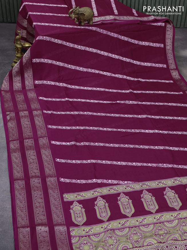 Semi georgette saree dark magenta pink with allover prints and long zari woven border