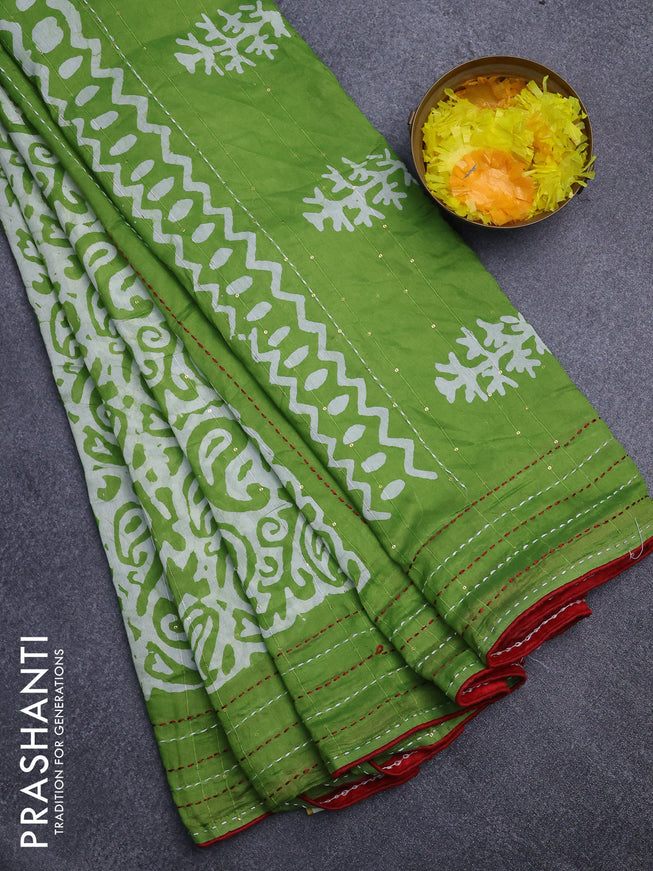 Batik cotton saree light green and red with allover batik prints & sequin work and kantha stitch work border