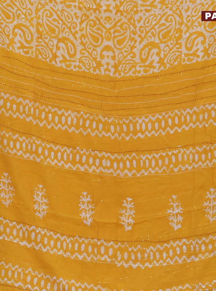 Batik cotton saree yellow and red with allover batik prints & sequin work and kantha stitch work border