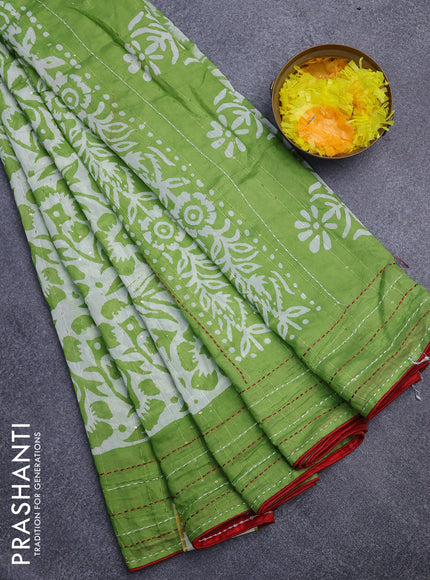 Batik cotton saree light green and red with allover batik prints & sequin work and kantha stitch work border