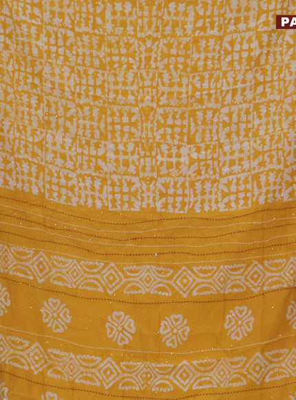 Batik cotton saree mango yellow and red with allover batik prints & sequin work and kantha stitch work border