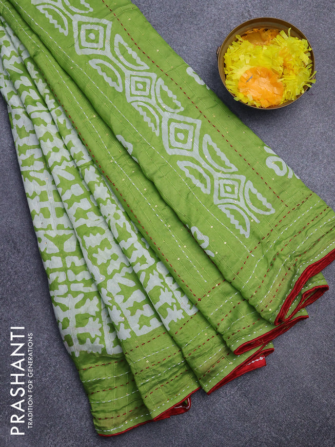 Batik cotton saree light green and red with allover batik prints & sequin work and kantha stitch work border