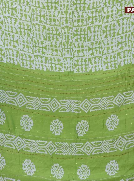 Batik cotton saree light green and red with allover batik prints & sequin work and kantha stitch work border